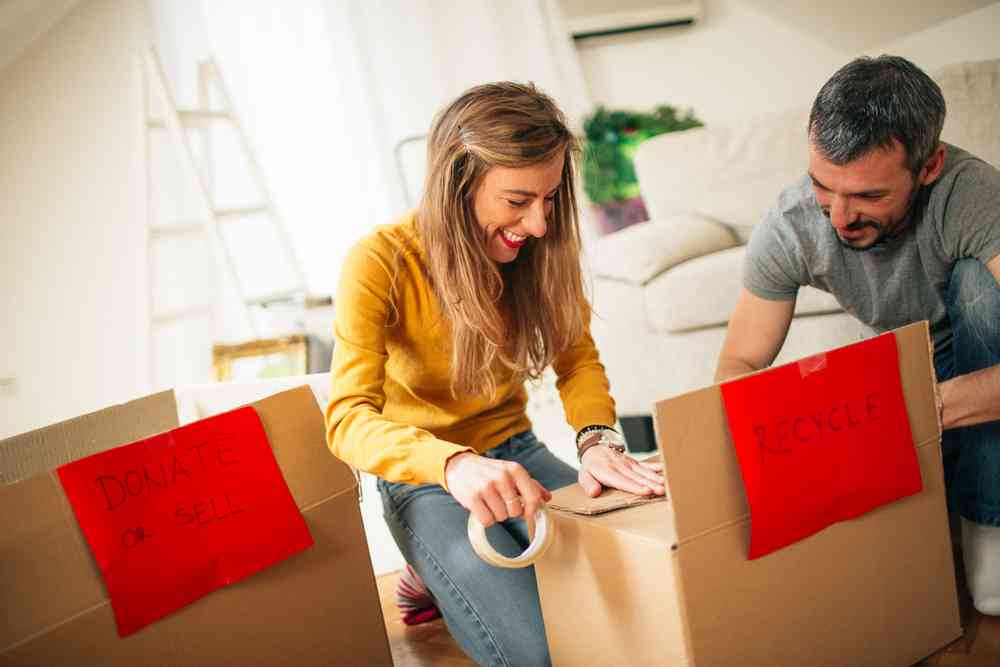 couple packing clutter