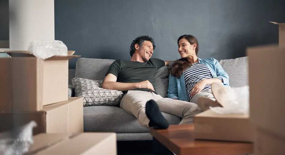 couple sitting in new house