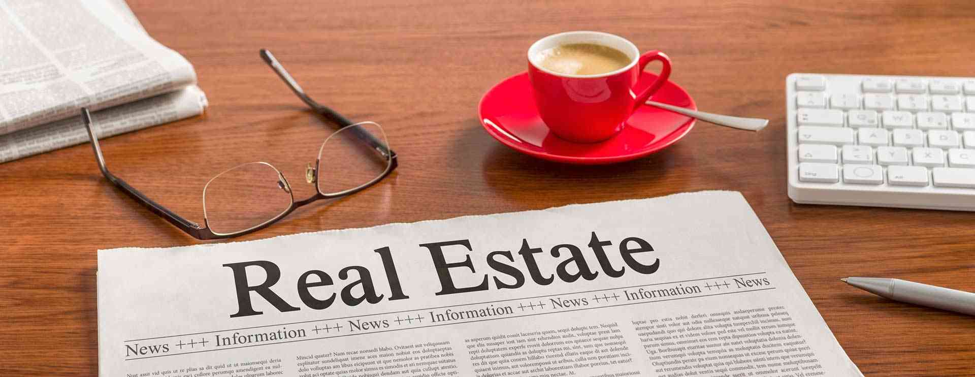 newspaper titled real estate