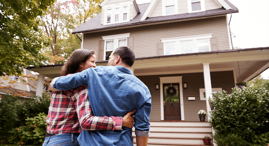 couple enjoying house landscaping