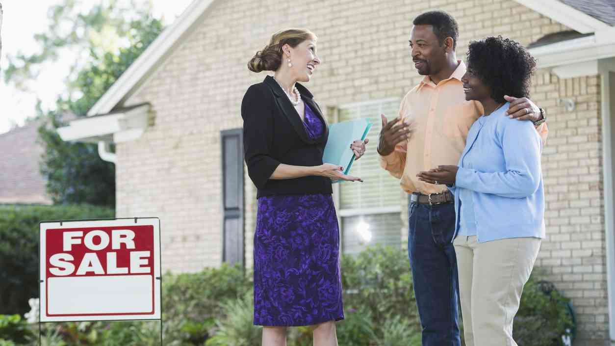 couple visiting house available for sale