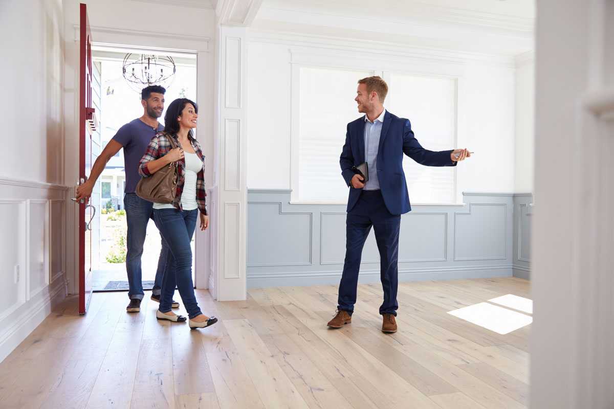 couple visiting inside of house