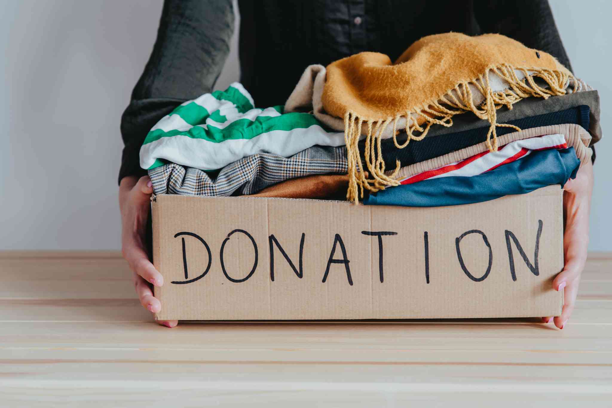 image representing donating old clothes