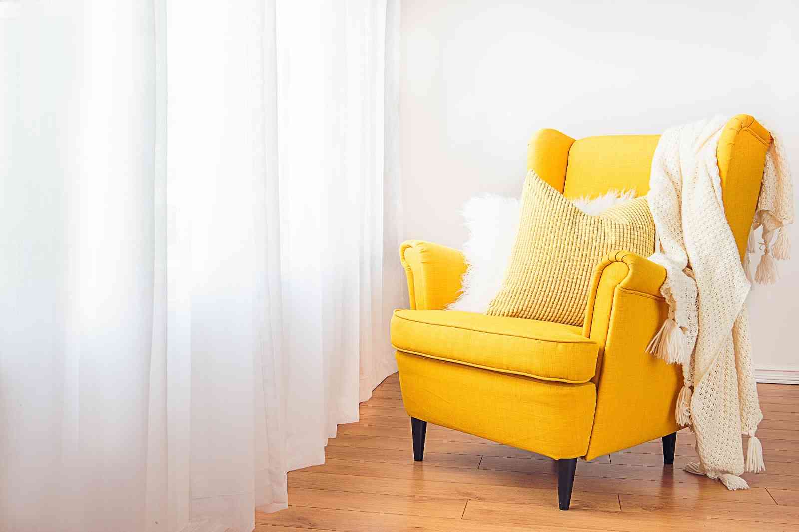 image of yellow colored sofa