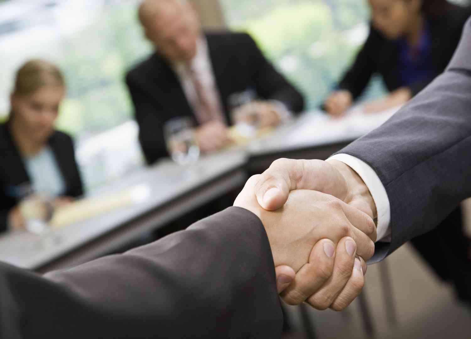 image of two person shaking hand