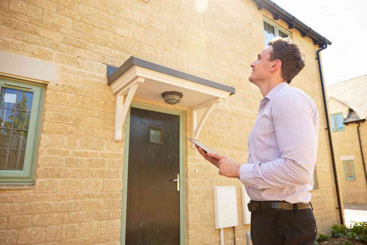 image of person doing survey of house