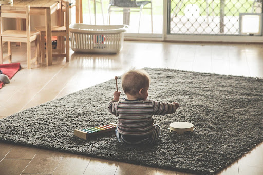 child playing on floor