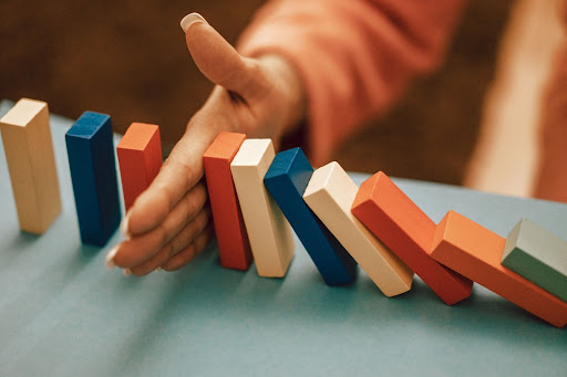 hand holding triangular bars